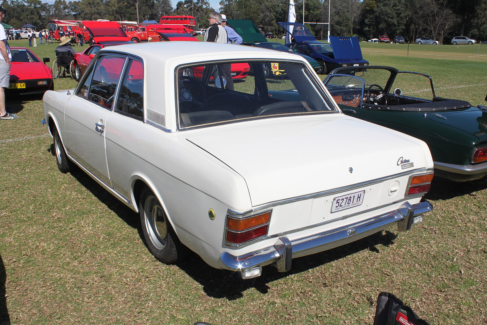 1969 Ford Lotus Cortina Mk2 in original colours, showing the more conventional Mk2 body style with the Lotus stripe and badging