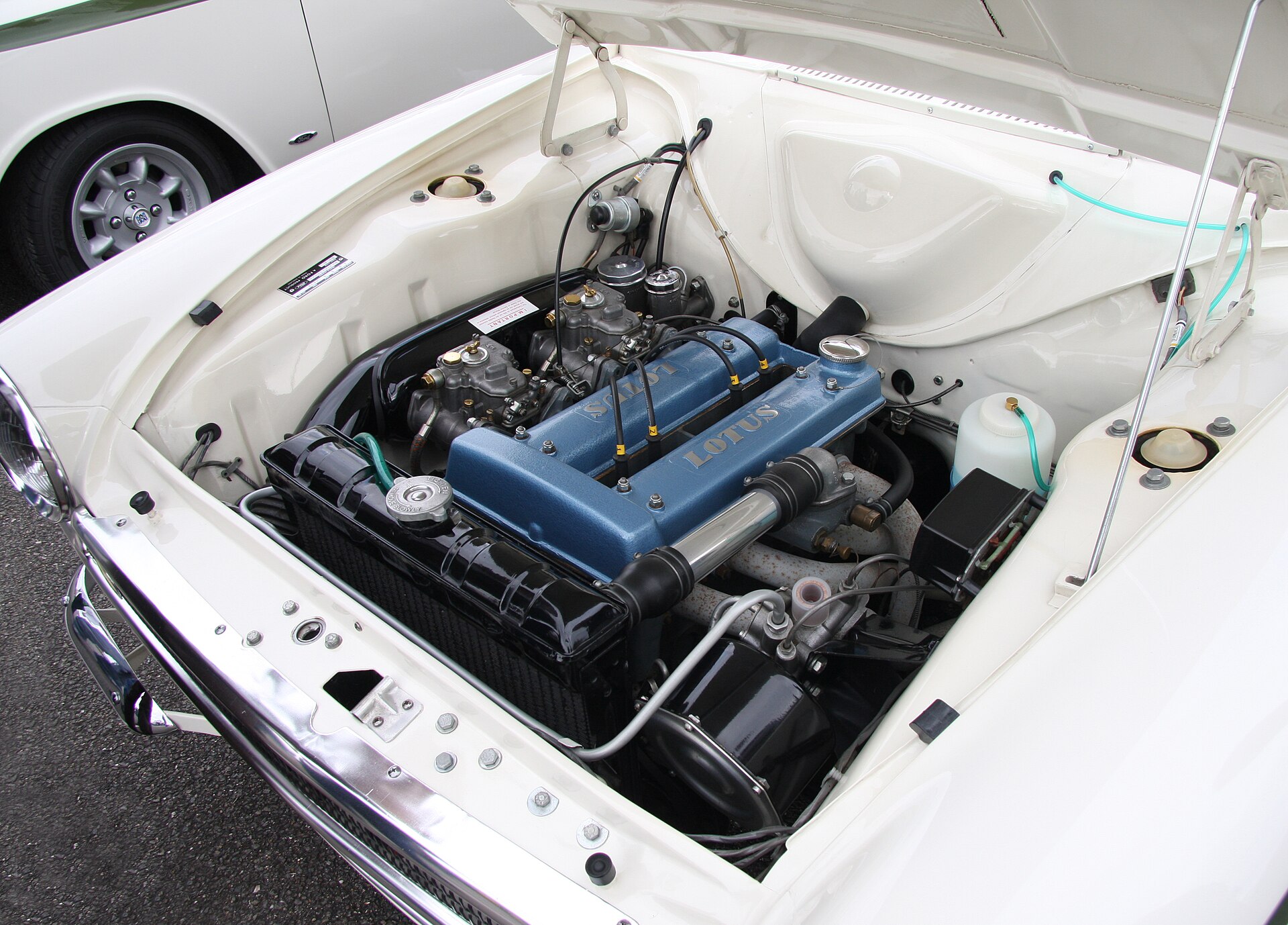 Lotus Ford twin-cam 1558cc engine in a Mk1 Lotus Cortina engine bay, showing the dual Weber DCOE carburettors and Lotus cam covers