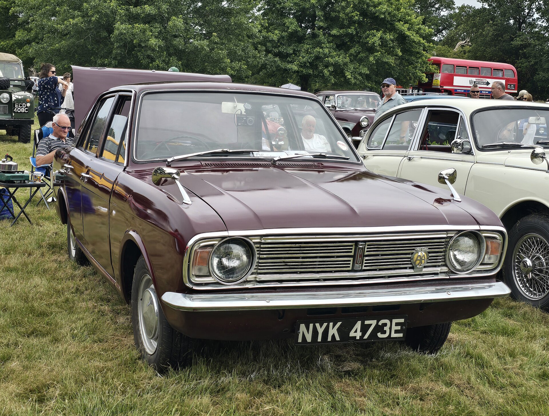 1967 Ford Cortina Mk2 De Luxe two-door saloon in red, the body style shared with the 1600E and Lotus Cortina variants
