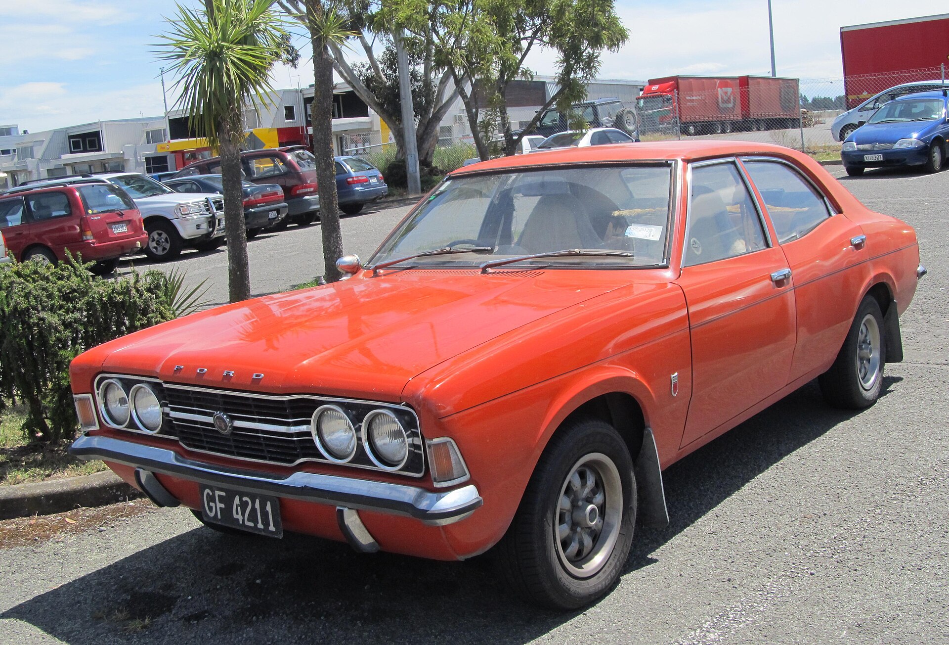 1972 Ford Cortina Mk3 2000 GT in metallic green showing the sports-trim version of the Coke-bottle saloon