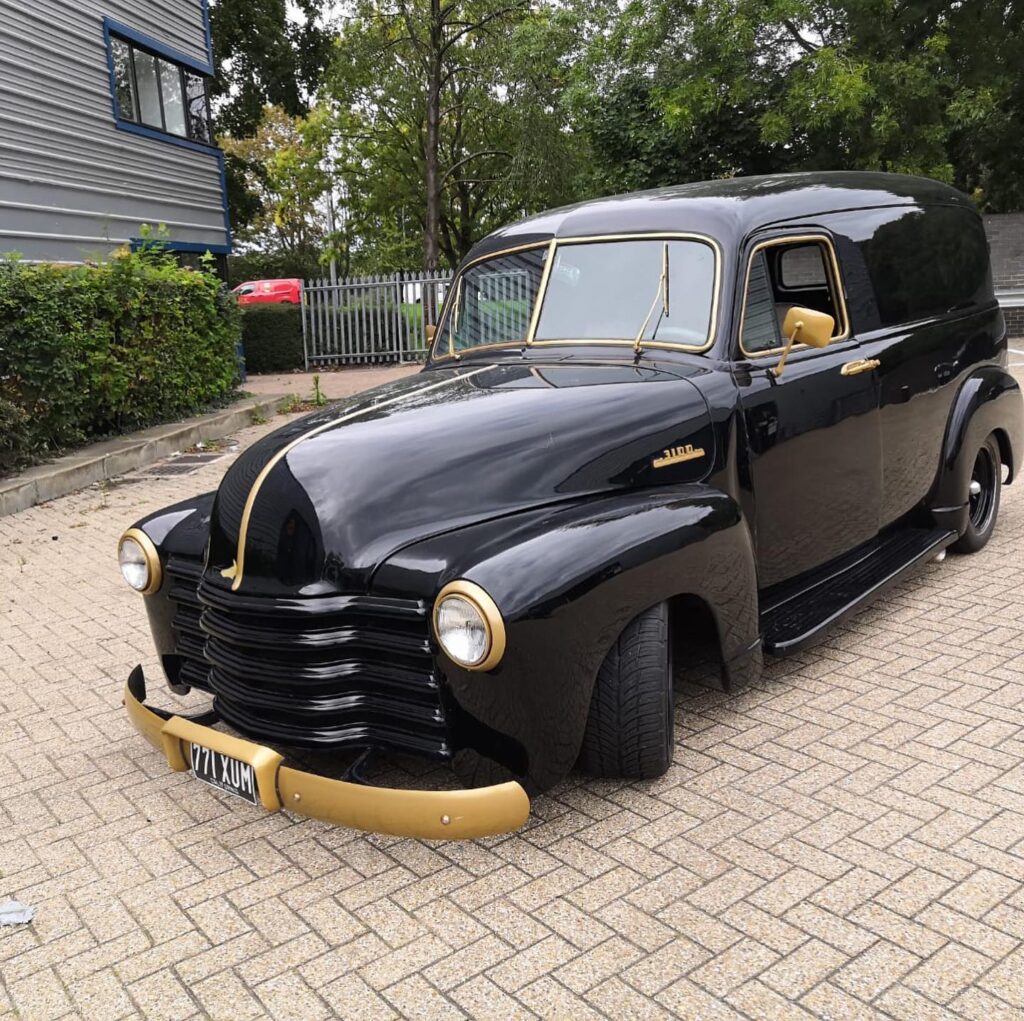 1951 Chevrolet 3100 Panel Van front angle, gloss black with gold trim by Top Touch Coachworks