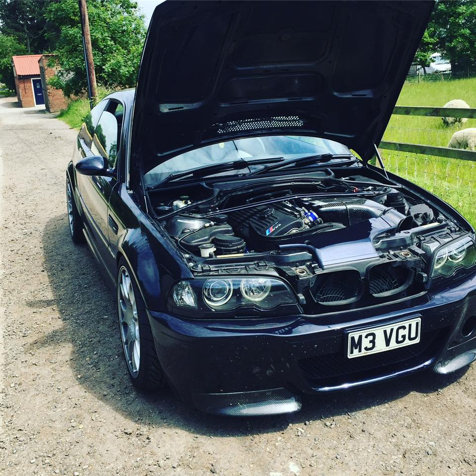 Ford Escort RS Cosworth with bonnet up showing detailed engine bay, work by Top Touch Coachworks near Milton Keynes