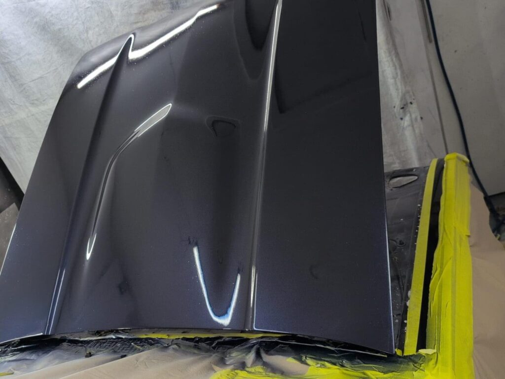 Ford Capri bonnet freshly sprayed dark blue in spray booth at Top Touch Coachworks