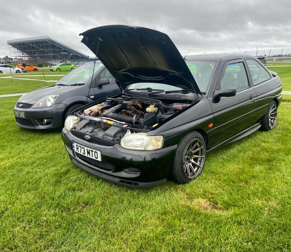 Ford Escort GTI at Ford Fair with bonnet up showing engine bay
