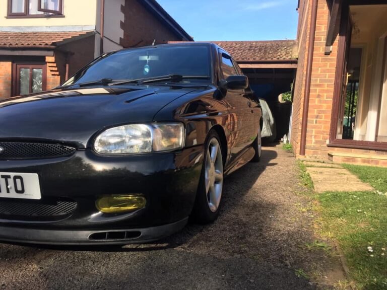 Ford Escort GTI front three-quarter low angle, gloss black respray near Milton Keynes