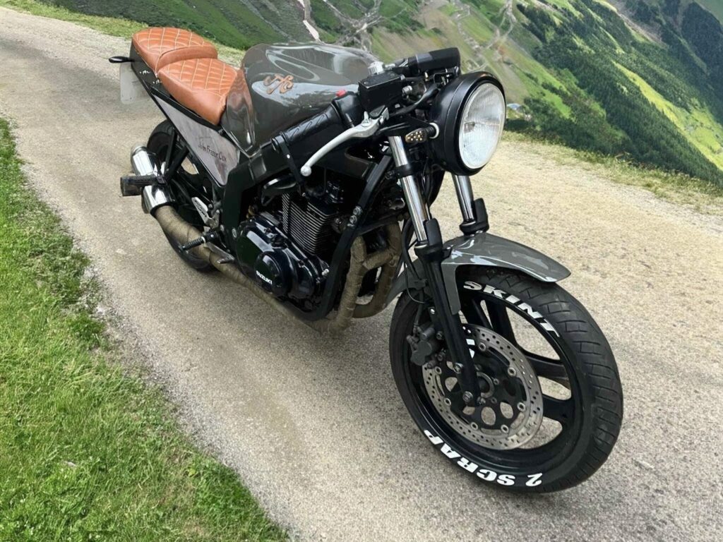 Suzuki GS500F cafe racer on mountain road, custom build near Milton Keynes