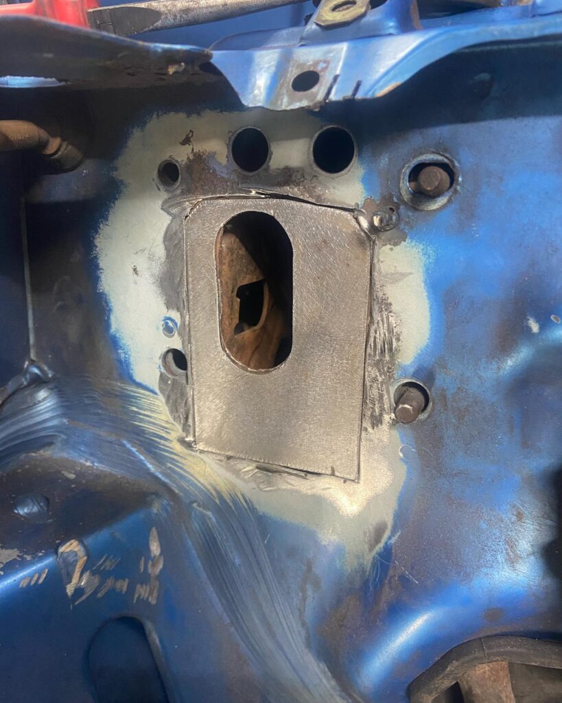 Fabricated repair plate welded onto bulkhead, structural welding at Top Touch Coachworks