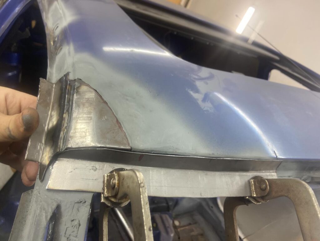 Custom fabricated repair panel test-fitted on A-pillar, panel fabrication near Buckingham