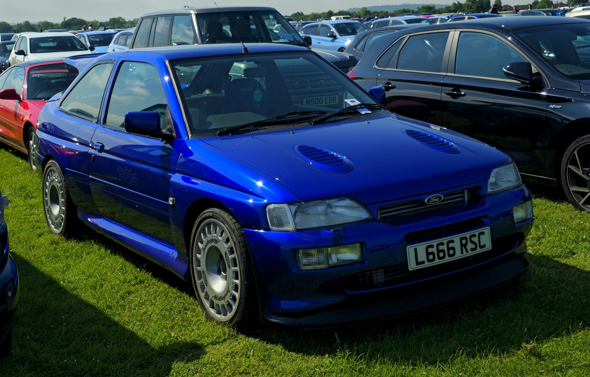 1994 Ford Escort RS Cosworth — the YB-engined four-wheel-drive homologation monster with the unmistakable rear wing