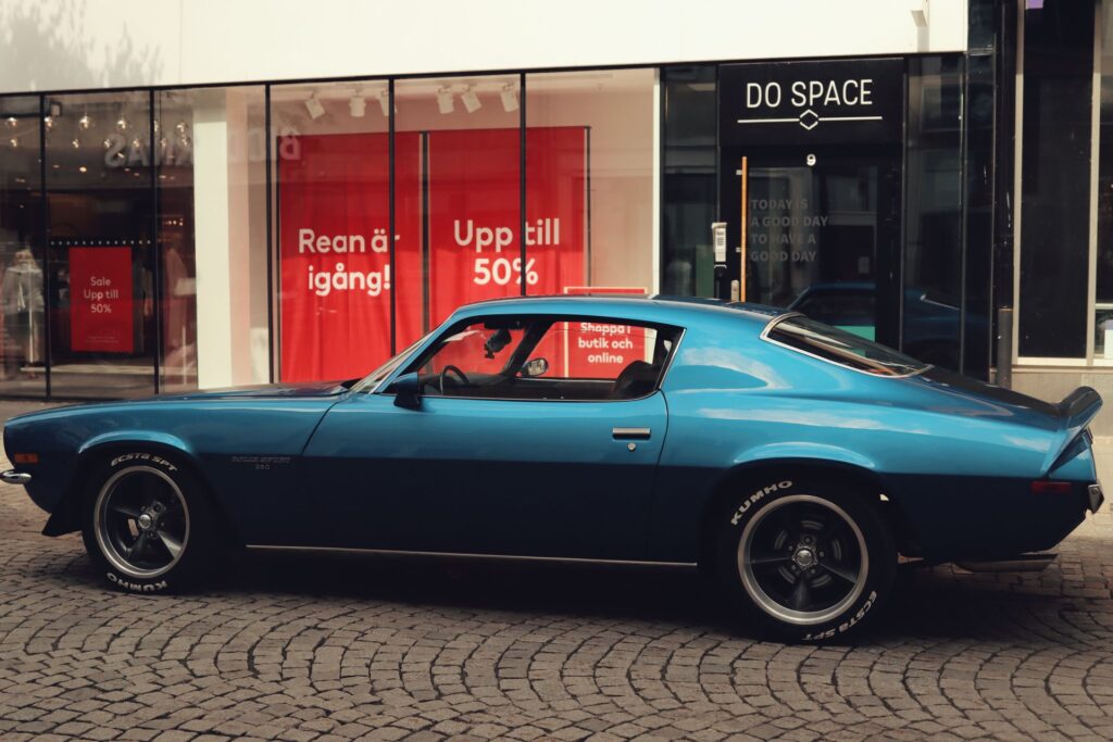 A classic car parked on a street